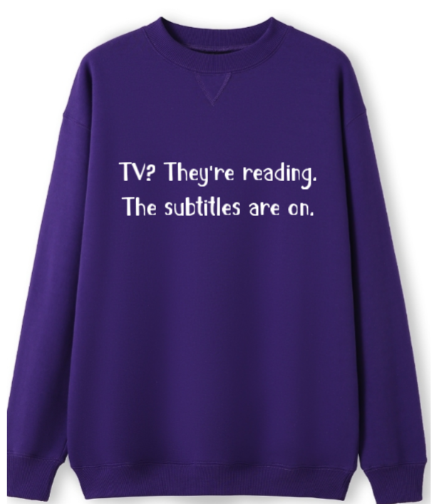 TV? They're reading. The subtitles are on Crewneck Sweater